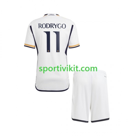 Completo da calcio Bambini Real Madrid Rodrygo Goes 11 Maglia Prima 2023-2024 Manica Corta Completo da calcio Bambini Real Madrid Rodrygo Goes 11 Maglia Prima 2023-2024 Manica Corta